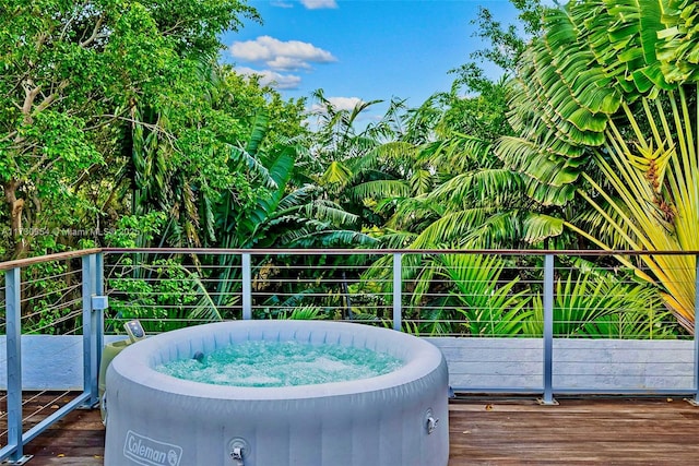 balcony with a hot tub