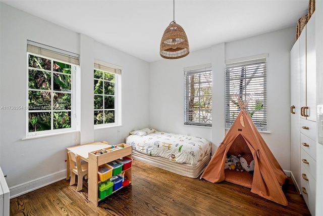 bedroom featuring hardwood / wood-style floors