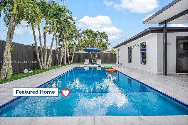 view of pool with a patio