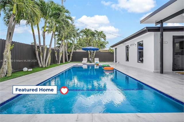 7900 SW 97th Ave, Miami, FL 33173 - view of pool featuring a fenced backyard and a patio