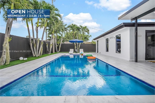 view of pool with a patio