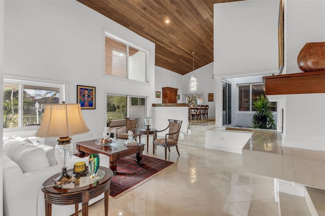 living room featuring wooden ceiling and high vaulted ceiling