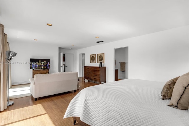 bedroom featuring light wood-type flooring