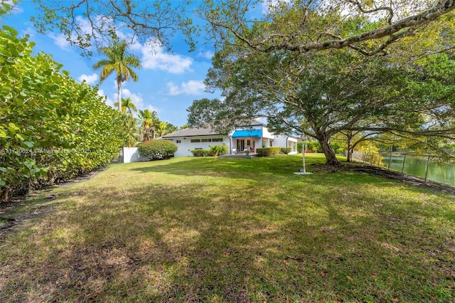 view of yard with a water view