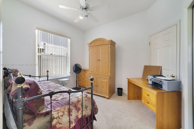 bedroom with light colored carpet and ceiling fan