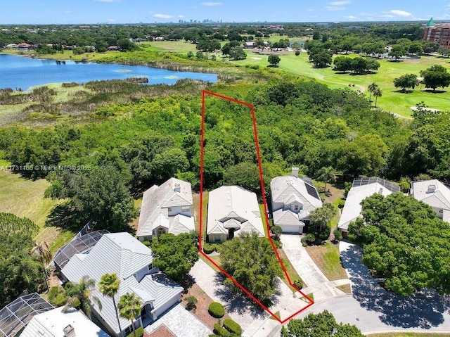 birds eye view of property featuring a water view