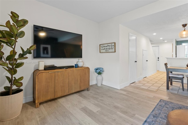 living room with light hardwood / wood-style floors