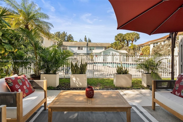 balcony featuring outdoor lounge area and a patio area