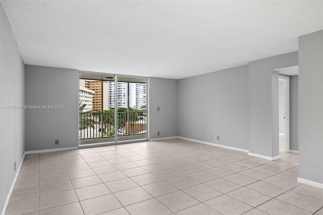 view of tiled spare room