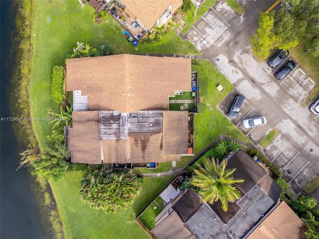 drone / aerial view with a water view