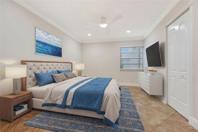 bedroom with light tile patterned floors, crown molding, and ceiling fan