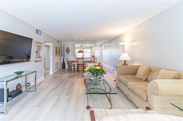 living room featuring light wood-type flooring