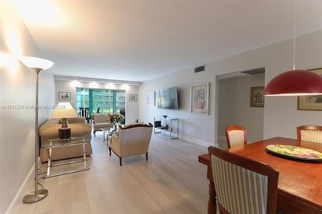 living room featuring light wood-type flooring