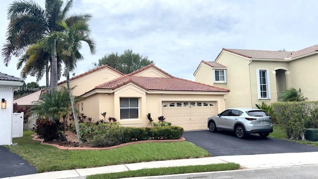 mediterranean / spanish-style home featuring a garage