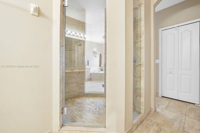 full bathroom featuring a shower stall