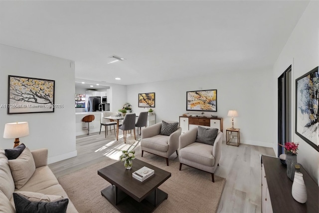 living room featuring light hardwood / wood-style floors