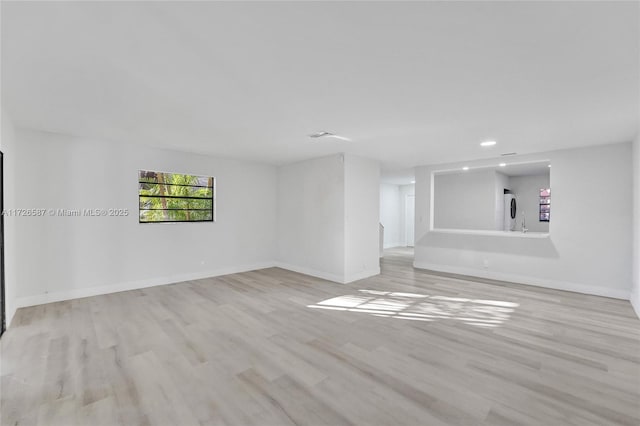 empty room featuring light wood-type flooring