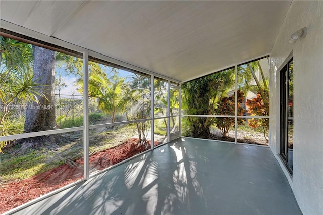 unfurnished sunroom with plenty of natural light