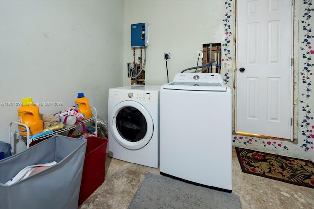 laundry area with independent washer and dryer