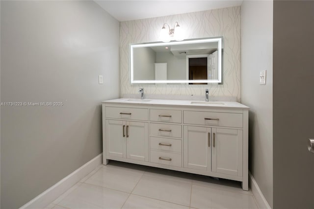 bathroom featuring tile patterned flooring and vanity