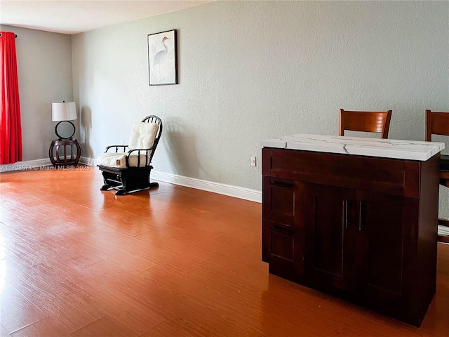 living area featuring dark hardwood / wood-style flooring