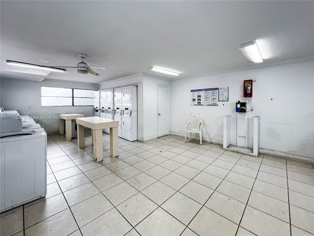 kitchen featuring ceiling fan, independent washer and dryer, and ornamental molding