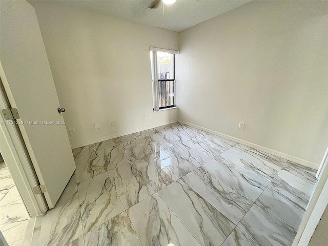 unfurnished room featuring ceiling fan