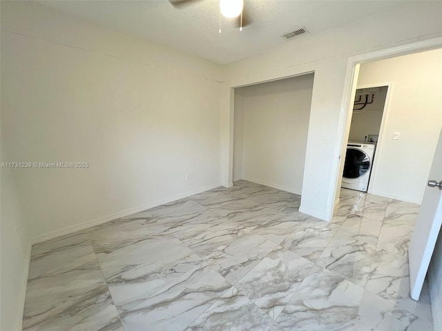 unfurnished bedroom with washer / clothes dryer, a closet, a textured ceiling, and ceiling fan