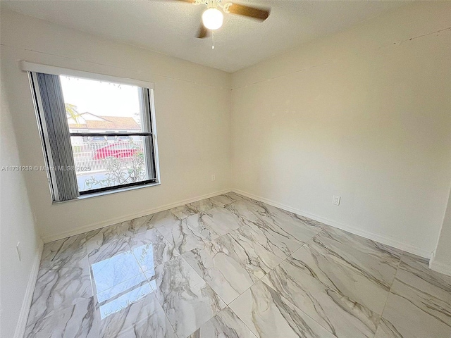 empty room with ceiling fan