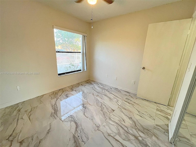 unfurnished room featuring ceiling fan