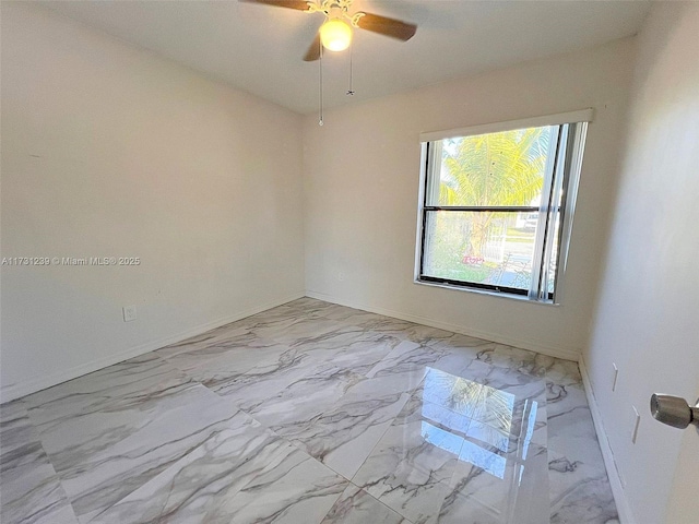 spare room featuring ceiling fan