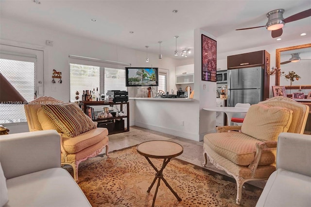 living room featuring ceiling fan