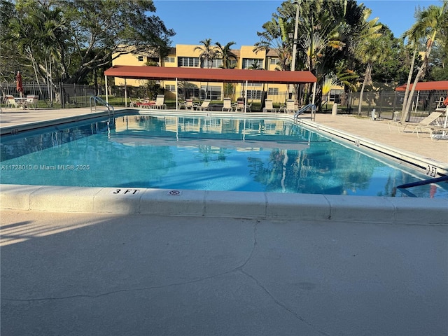6150 NW 62nd St Unit 312, Tamarac, FL 33319 - pool with fence and a patio area