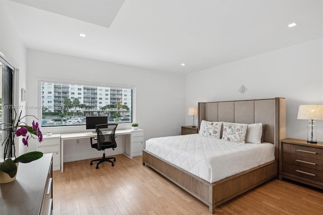 bedroom with light wood-type flooring