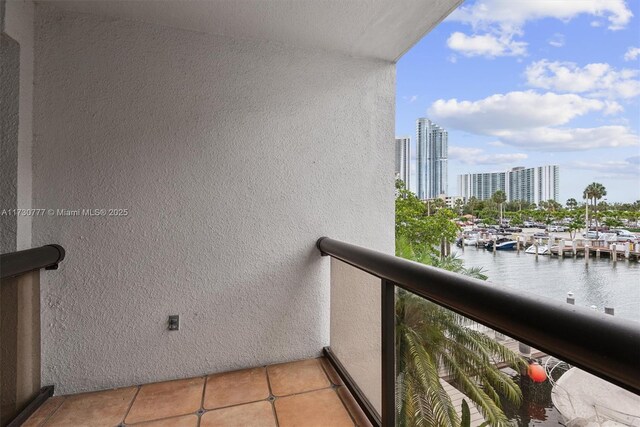 balcony featuring a water view