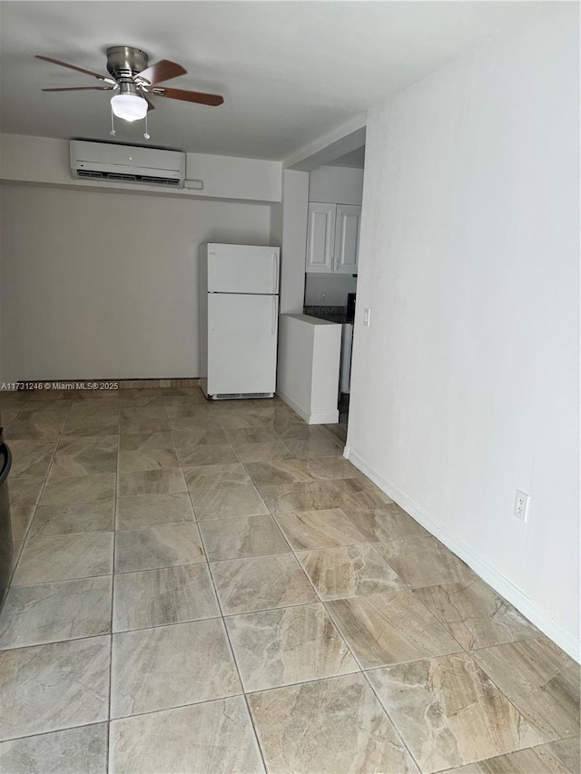 unfurnished room featuring ceiling fan and a wall mounted air conditioner