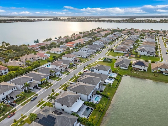 drone / aerial view featuring a water view