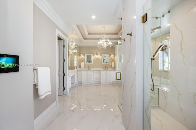 bathroom featuring a chandelier, ornamental molding, vanity, walk in shower, and a raised ceiling