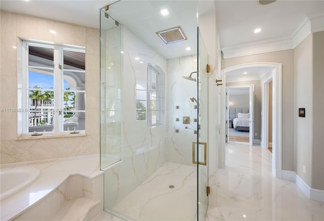 bathroom with crown molding and a shower with shower door