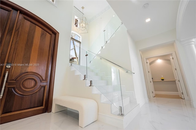 entrance foyer with a notable chandelier