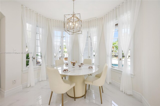 dining area featuring a chandelier