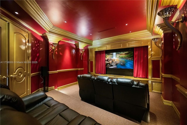 carpeted home theater with crown molding