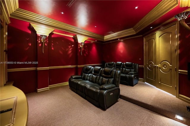 cinema featuring crown molding and carpet flooring