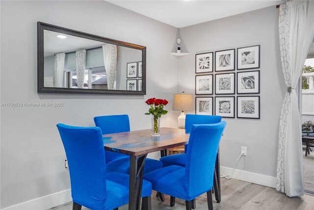 dining area featuring light hardwood / wood-style flooring