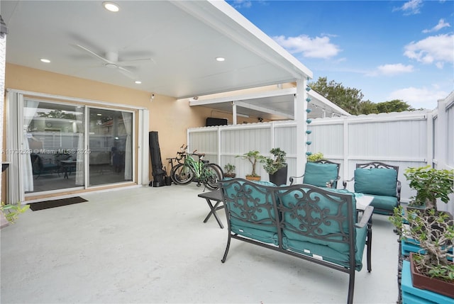 view of patio / terrace featuring ceiling fan