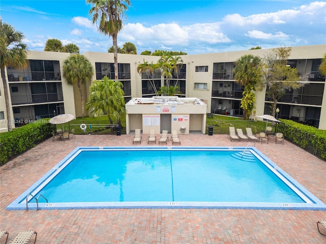 view of pool featuring a patio