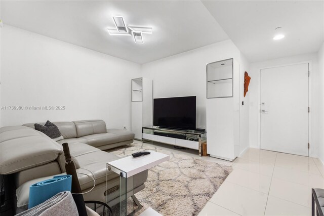 living room featuring light tile patterned flooring