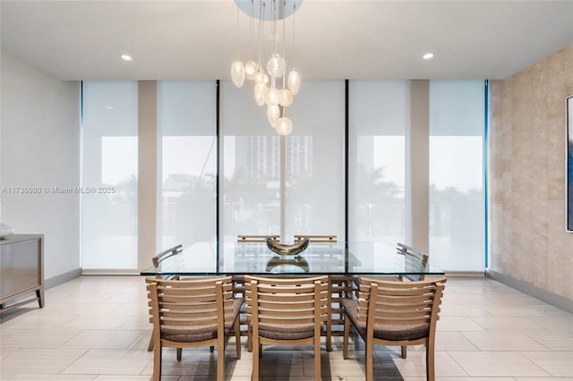 dining area featuring expansive windows