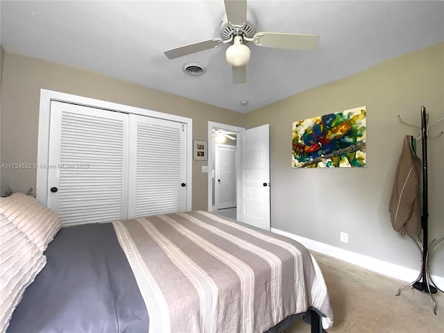 carpeted bedroom with ceiling fan