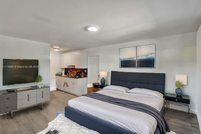 bedroom featuring light wood-type flooring